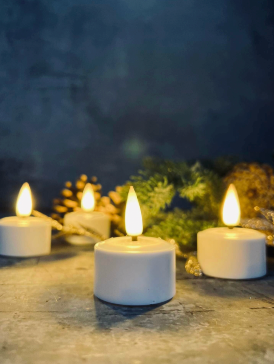 Akumulatorowe świeczki tealight 4 szt. - stacja ładująca w zestawie